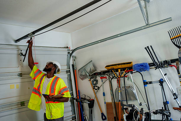 Professional Garage Door Installation technician working in Hartford, AL